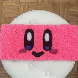 Pink puff character-inspired keyboard rug